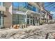 Modern building facade with a retail space and landscaping at 1080 Peachtree Ne St # 2003, Atlanta, GA 30309