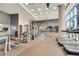 Well-equipped gym with modern machines, mirrors, and plenty of space for workouts at 1080 Peachtree Ne St # 2003, Atlanta, GA 30309