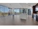 Bright, open living space with floor-to-ceiling windows offering stunning city views at 1080 Peachtree Ne St # 2003, Atlanta, GA 30309