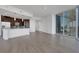 Bright condo with an open floor plan, kitchen island, and expansive city views at 1080 Peachtree Ne St # 2003, Atlanta, GA 30309