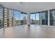 Spacious living room featuring expansive windows and modern design elements at 1080 Peachtree Ne St # 2003, Atlanta, GA 30309