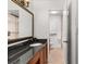 Bathroom with granite countertop, wood cabinet, and separate shower room at 3203 Lenox Ne Rd # 1, Atlanta, GA 30324