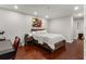 Modern bedroom featuring hardwood floors, recessed lighting, and stylish decor at 3203 Lenox Ne Rd # 1, Atlanta, GA 30324
