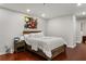 Bright bedroom featuring hardwood floors and art, creating a welcoming space at 3203 Lenox Ne Rd # 1, Atlanta, GA 30324