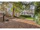 Well-maintained community dog park with green space and convenient pet waste station at 3203 Lenox Ne Rd # 1, Atlanta, GA 30324