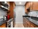 Updated kitchen featuring stainless steel appliances, granite countertops and modern backsplash at 3203 Lenox Ne Rd # 1, Atlanta, GA 30324