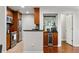 Modern kitchen with wood cabinets, stainless appliances, and bar area perfect for entertaining guests at 3203 Lenox Ne Rd # 1, Atlanta, GA 30324