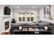 Sophisticated living room with fireplace and recessed lights offering access to a small balcony at 3203 Lenox Ne Rd # 1, Atlanta, GA 30324