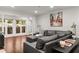 Bright and airy living room with hardwood floors and double French doors to patio at 3203 Lenox Ne Rd # 1, Atlanta, GA 30324