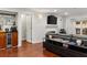 Living room featuring hardwood floors, a fireplace, and access to a covered patio at 3203 Lenox Ne Rd # 1, Atlanta, GA 30324