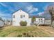 Grassy backyard showcasing a deck, storage shed, and well-maintained lawn, creating an inviting outdoor space at 785 Josh Ln, Lawrenceville, GA 30045
