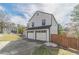 Well-maintained two-story home with a spacious two-car garage and a fenced backyard at 785 Josh Ln, Lawrenceville, GA 30045