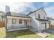 Charming home featuring a covered front porch and two-car garage at 785 Josh Ln, Lawrenceville, GA 30045