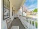 Inviting front porch with white railing, perfect for relaxing and enjoying the outdoors at 785 Josh Ln, Lawrenceville, GA 30045