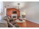 Spacious living room featuring a fireplace and a comfortable seating area at 785 Josh Ln, Lawrenceville, GA 30045