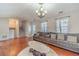 Bright living room with hardwood floors and a cozy seating area at 785 Josh Ln, Lawrenceville, GA 30045