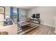 Inviting living room featuring comfortable seating, stylish decor, and ample natural light at 1220 Arnhem Dr, Hampton, GA 30228