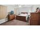 Bedroom with a bed, dresser, and neutral tones at 1618 Blossom Dr, Atlanta, GA 30349