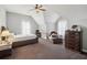 A bedroom featuring a ceiling fan and two beds at 1618 Blossom Dr, Atlanta, GA 30349