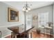Stylish dining area featuring wood floors and modern chandelier at 1618 Blossom Dr, Atlanta, GA 30349