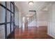 Welcoming foyer with hardwood floors, arched doorways, and a view of the staircase at 301 Windswept Ct, Powder Springs, GA 30127