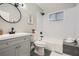 Updated bathroom with a gray vanity, modern fixtures, and subway tile shower at 3395 Lake Valley Nw Rd, Atlanta, GA 30331