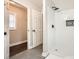 Shower features sleek white subway tile with a stylish black shower head at 3395 Lake Valley Nw Rd, Atlanta, GA 30331