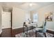 Bedroom featuring hardwood floors, neutral walls, and natural light from the windows at 3395 Lake Valley Nw Rd, Atlanta, GA 30331