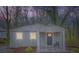 Charming single-story home featuring a covered porch, gray siding, and freshly landscaped yard at 3395 Lake Valley Nw Rd, Atlanta, GA 30331