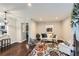 Bright living room boasts hardwood floors, neutral walls, and a stylish area rug at 3395 Lake Valley Nw Rd, Atlanta, GA 30331