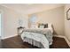 Cozy primary bedroom with hardwood flooring and neutral paint at 3395 Lake Valley Nw Rd, Atlanta, GA 30331