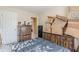 Bedroom with dresser covered in moving boxes at 71 Farm St, Hiram, GA 30141