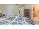Main bedroom featuring an adjacent bathroom and dark wood furniture at 71 Farm St, Hiram, GA 30141