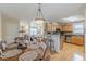 Open floorplan seamlessly connecting the kitchen, dining, and living areas for modern living at 71 Farm St, Hiram, GA 30141
