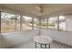 Enclosed back porch with views of the backyard at 71 Farm St, Hiram, GA 30141