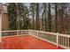 View of the spacious back deck overlooking the natural wooded area at 727 Vinings Estates Se Dr, Mableton, GA 30126
