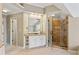 Primary bathroom with granite countertops, tile shower, and a vanity at 727 Vinings Estates Se Dr, Mableton, GA 30126