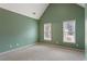 Bedroom with high ceilings and large windows for lots of natural light at 727 Vinings Estates Se Dr, Mableton, GA 30126