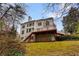 Exterior shot of back of home with deck at 727 Vinings Estates Se Dr, Mableton, GA 30126