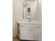 Bathroom vanity with a white countertop and a mirror at 727 Vinings Estates Se Dr, Mableton, GA 30126