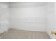 Walk-in closet with built-in shelving for optimal organization at 727 Vinings Estates Se Dr, Mableton, GA 30126