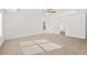 Sunlit main bedroom with carpet, ceiling fan and ensuite bath at 13224 Tolstoy, Covington, GA 30014