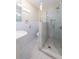 Bright bathroom featuring white subway tile, glass shower door, and modern fixtures at 139 W Paces Ferry Nw Rd, Atlanta, GA 30305