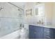 Bright bathroom featuring tiled shower, updated vanity, and neutral color palette at 139 W Paces Ferry Nw Rd, Atlanta, GA 30305