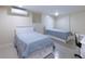 Bedroom featuring two beds, light colored walls and flooring, and contemporary decor at 139 W Paces Ferry Nw Rd, Atlanta, GA 30305