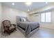 Bedroom with large decorative headboard and shuttered window allowing natural light at 139 W Paces Ferry Nw Rd, Atlanta, GA 30305