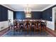 Formal dining room with a chandelier and a large table for entertaining at 139 W Paces Ferry Nw Rd, Atlanta, GA 30305