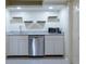 Clean kitchenette with stainless steel appliances, gray counters and cabinets at 139 W Paces Ferry Nw Rd, Atlanta, GA 30305