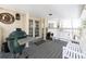 Covered porch featuring a grill, bench seating, and ceiling detail at 139 W Paces Ferry Nw Rd, Atlanta, GA 30305