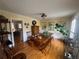 Dining room with hardwood floors, decorative moldings, and bright, sunny light at 2111 Kinridge Trl, Marietta, GA 30062